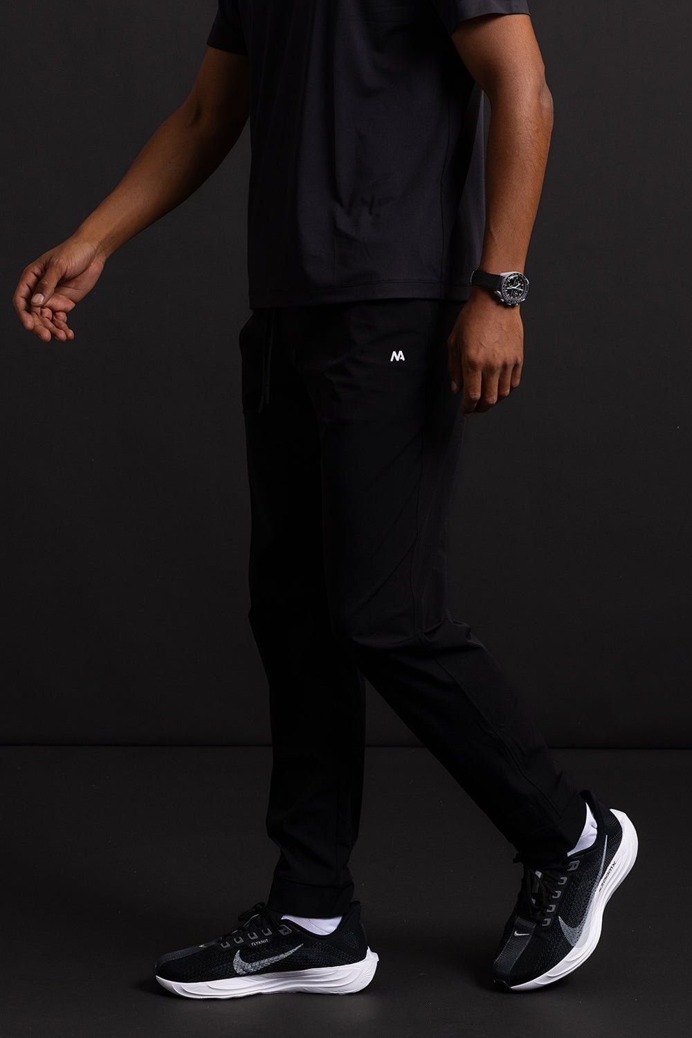 Men's long black sports pants. Stylish and comfortable sports pants for any workout in a black colour.